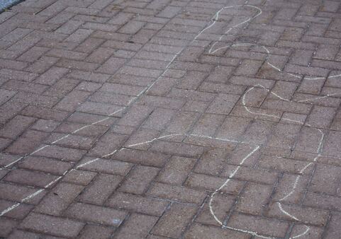 Chalk outline from homicide crime scene in Euless, TX